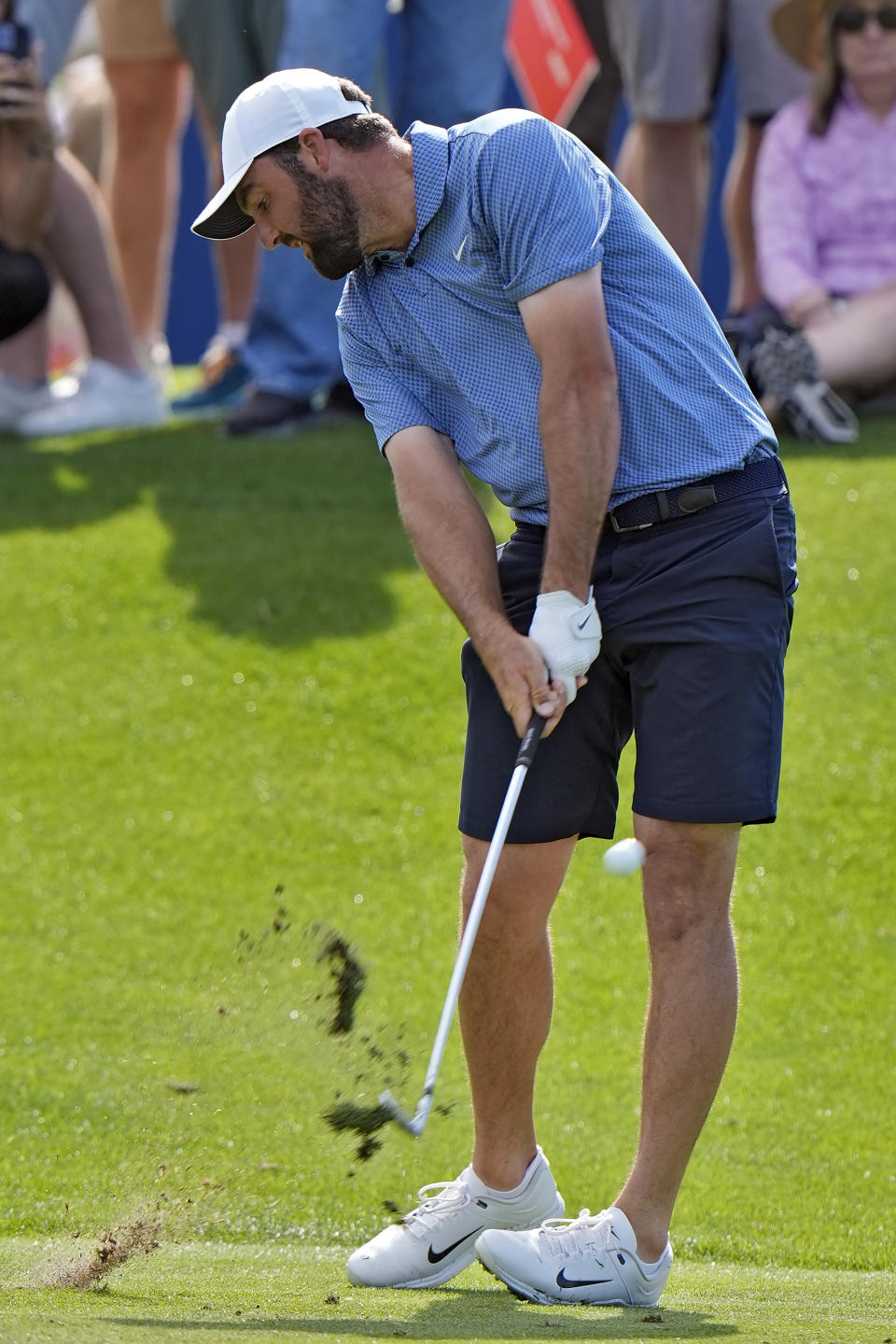 Scottie Scheffler hits from the third tee during a practice round for The Players Championship golf tournament Wednesday, March 13, 2024, in Ponte Vedra Beach, Fla. (AP Photo/Chris O'Meara)