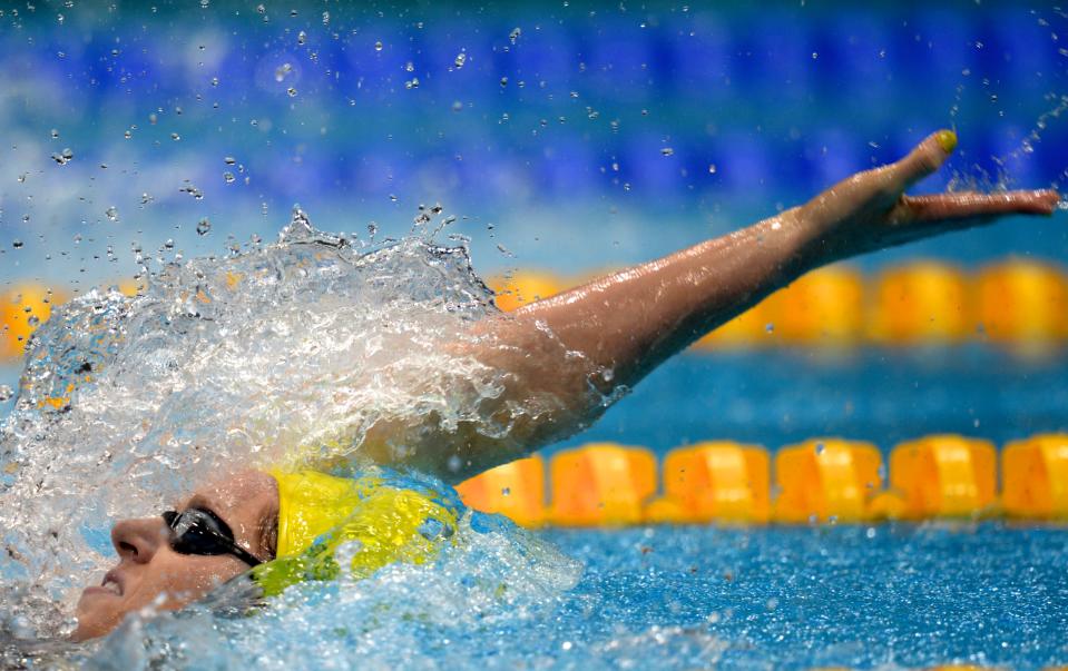 Australia's Emily Seebohm, in action during the women's 4x100m medley relay final at the Aquatics Centre during the Olympic Games in London, Saturday, Aug. 4, 2012. Australia finished 2nd to win the silver medal. (AAP Image/Dean Lewins) NO ARCHIVING