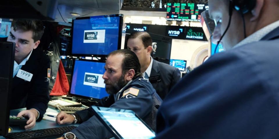 Traders on the floor of the New York Stock Exchange (NYSE)