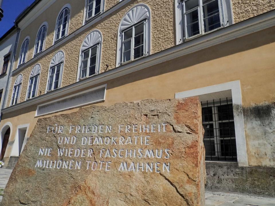 Hitler's birthplace, with a stone marker reading "For peace, freedom and democracy. Never more fascism. Millions of dead warn."