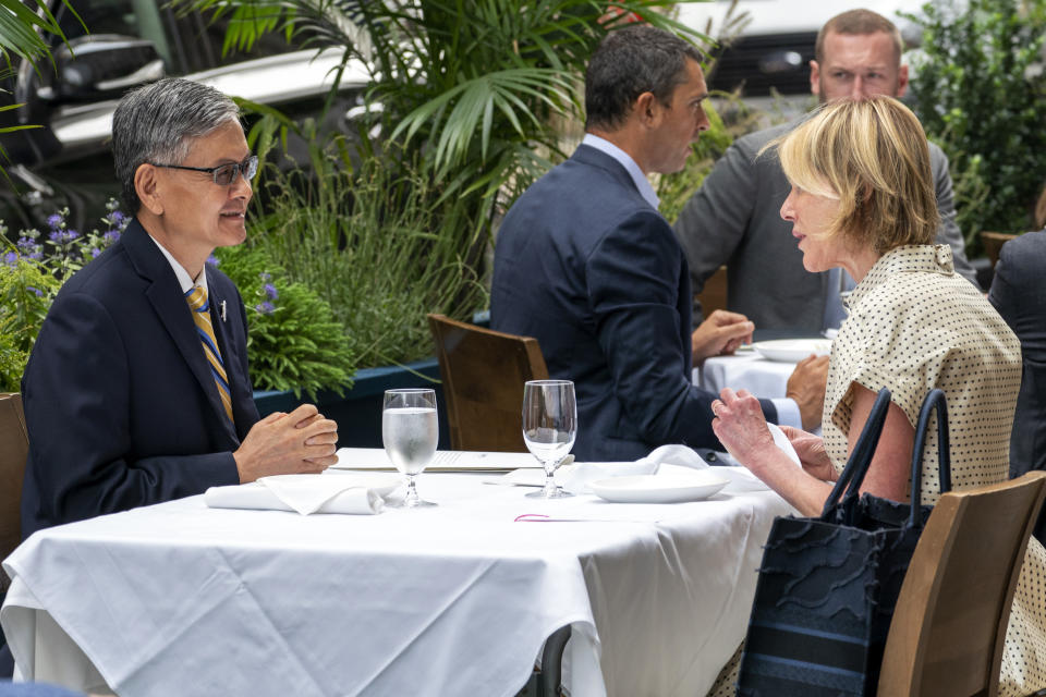 U.S. Ambassador to the United Nations Kelly Craft, right, meets James K.J. Lee, director-general of the Taipei Economic and Cultural Office in New York, for lunch at a restaurant in Midtown Manhattan, Wednesday, Sept. 16, 2020. (AP Photo/Mary Altaffer)