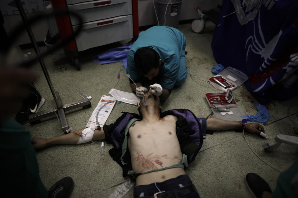 A Palestinian wounded in the Israeli bombardment of the Gaza Strip receives treatment at the Nasser hospital in Khan Younis, Southern Gaza Strip, Monday, Jan. 22, 2024. (AP Photo/Mohammed Dahman)
