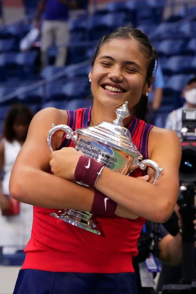 Britain's Emma Raducanu celebrates with the trophy after winning the 2021 US Open Tennis tournament women's final match against Canada's Leylah Fernandez. (Photo: TIMOTHY A. CLARY via Getty Images)