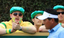 MELBOURNE, AUSTRALIA - NOVEMBER 18: A fan cheers for K.J. Choi of the International Team as he walks off the ninth tee during the Day Two Four-Ball Matches of the 2011 Presidents Cup at Royal Melbourne Golf Course on November 18, 2011 in Melbourne, Australia. (Photo by Scott Halleran/Getty Images)