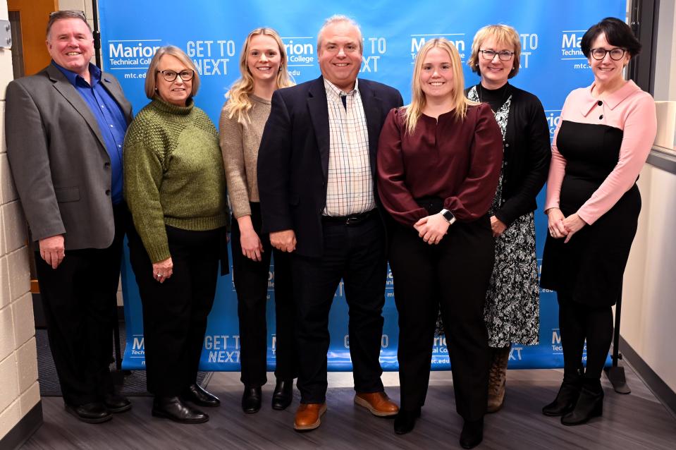 Businessman Kit Fogle and his family established the David and Jane Fogle Scholarship Fund at Marion Technical College. The family includes Mike Stuckey, left, Roxane Somerlot, Alexis Fogle, Kit Fogle, Abigail Spears, Ellen Messenger and Dr. Amy Adams.