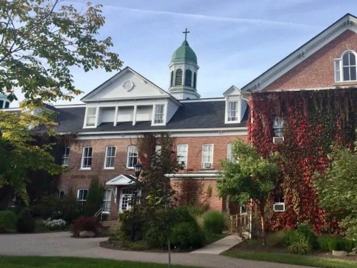 St. Francis Xavier University in Cape Breton is facing questions on how it handles sexualized violence on campus after a student, who also played on the university's football team, was charged with four counts of sexual assault. (Elizabeth McMillan/CBC - image credit)