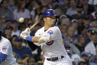 Chicago Cubs' Seiya Suzuki takes a high pitch from Washington Nationals starting pitcher Paolo Espino during the third inning of a baseball game Tuesday, Aug. 9, 2022, in Chicago. (AP Photo/Charles Rex Arbogast)