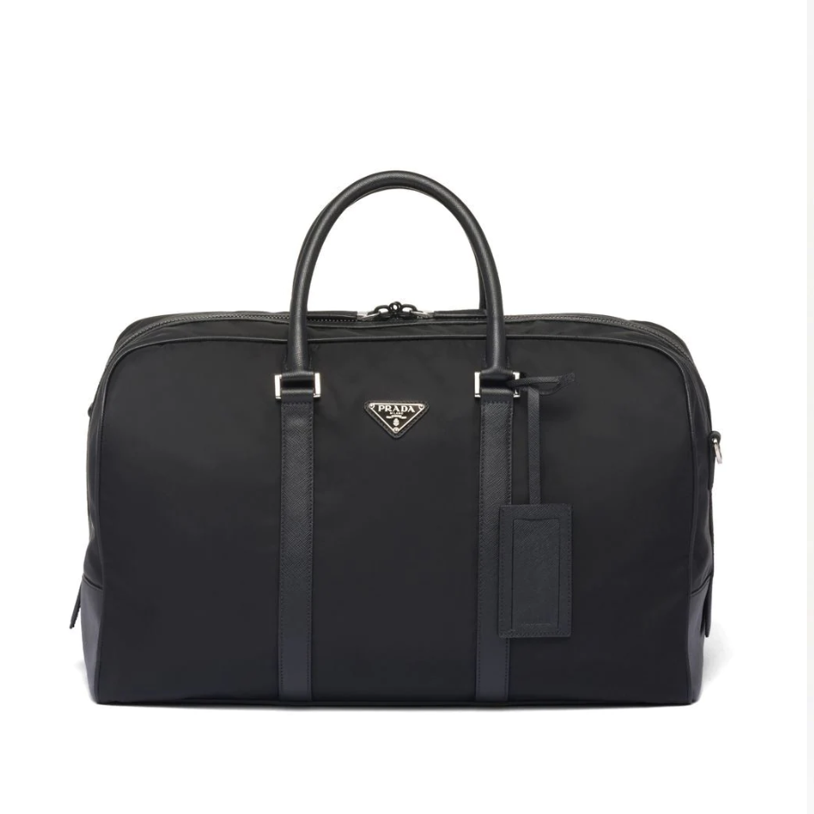 <p><a href="https://go.redirectingat.com?id=74968X1596630&url=https%3A%2F%2Fwww.farfetch.com%2Fshopping%2Fmen%2Fprada-triangle-logo-patch-duffel-bag-item-19007509.aspx&sref=https%3A%2F%2Fwww.harpersbazaar.com%2Ffashion%2Ftrends%2Fg41901959%2Fbest-designer-luggage%2F" rel="nofollow noopener" target="_blank" data-ylk="slk:Shop Now;elm:context_link;itc:0;sec:content-canvas" class="link ">Shop Now</a></p><p>Triangle Logo-Patch Duffel Bag</p><p>farfetch.com</p><p>$2750.00</p><span class="copyright">prada.com</span>