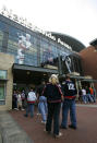 FILE - In this Sept. 22, 2005, file photo, hockey fans line up at the Nationwide Arena before the Columbus Blue Jackets host a preseason NHL hockey game against Detroit Red Wings in Columbus, Ohio. Nationwide Arena is one of the possible locations the NHL has zeroed in on to host playoff games if it can return amid the coronavirus pandemic. The league will ultimately decide on two or three locations for games, with government regulations, testing and COVID-19 frequency among the factors for the decision that should be coming within the next three to four weeks. (AP Photo/Kiichiro Sato, File)