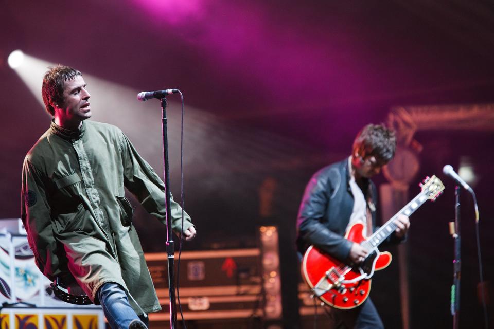 GRAEFENHAINICHEN, GERMANY - JULY 19:  Musicians Liam Gallagher (L) and Noel Gallagher of Oasis perform live at the Melt! Festival in Ferropolis on July 19, 2009 in Graefenhainichen, Germany.  (Photo by Marco Prosch/Getty Images)