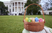 <p>In this 2018 photo provided by the White House Historical Association, colorful eggs created at Maine Wood Concepts in New Vineyard, Maine, are displayed outside the White House in Washington. Some of the 110,000 keepsakes created for the association will be used in the White House Easter Egg Roll on Monday, April 2. (Photo: David Wiegold/White House Historical Association via AP) </p>