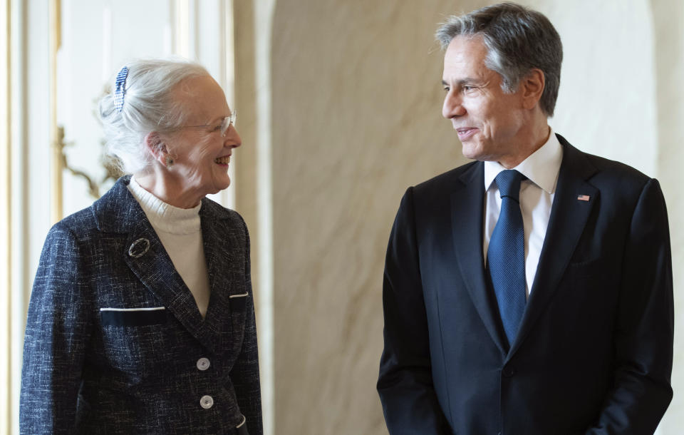 Denmark's Queen Margrethe II, left welcomes US Secretary of State Antony Blinken, during their meeting, at Amalienborg Palace in Copenhagen, Denmark, Monday, May 17, 2021. Blinken is seeing Danish leaders as well as top officials from Greenland and the Faeroe Islands in Copenhagen on Monday before he heads to Iceland for an Arctic Council meeting that will be marked by his first face-to-face talks with Russian Foreign Minister Sergey Lavrov at a time of significantly heightened tensions between Washington and Moscow. (Saul Loeb/Pool Photo via AP)