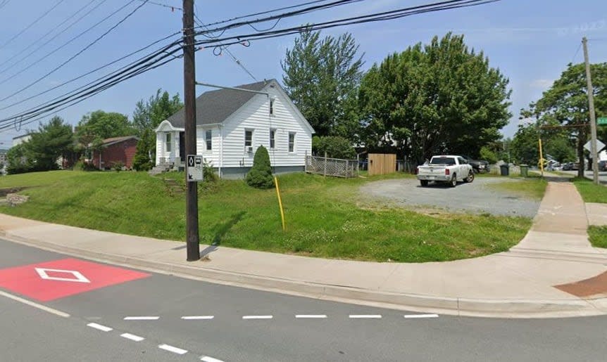 A gravel lot of surplus Halifax land sits to the right of 6739 Bayers Road, the white house. Halifax will now look for affordable housing projects to go on the 300 square-metre site.