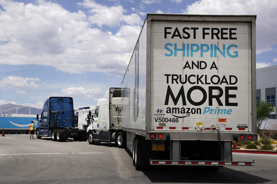 Trucks line up as security checks them into the Amazon regional distribution center last June in Las Vegas. (Photo: George Frey via Getty Images)