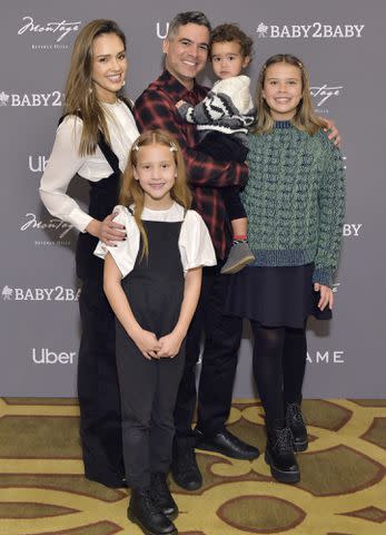 Stefanie Keenan/Getty Images Jessica Alba and Cash Warren with their kids in Beverly Hills, California, on Dec. 15, 2019