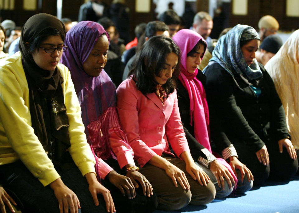 A group of women pray at the end of a public mixed-gender Muslim prayer service that was held in New York City, March 18, 2005.&nbsp; (Photo: Reuters Photographer / Reuters)