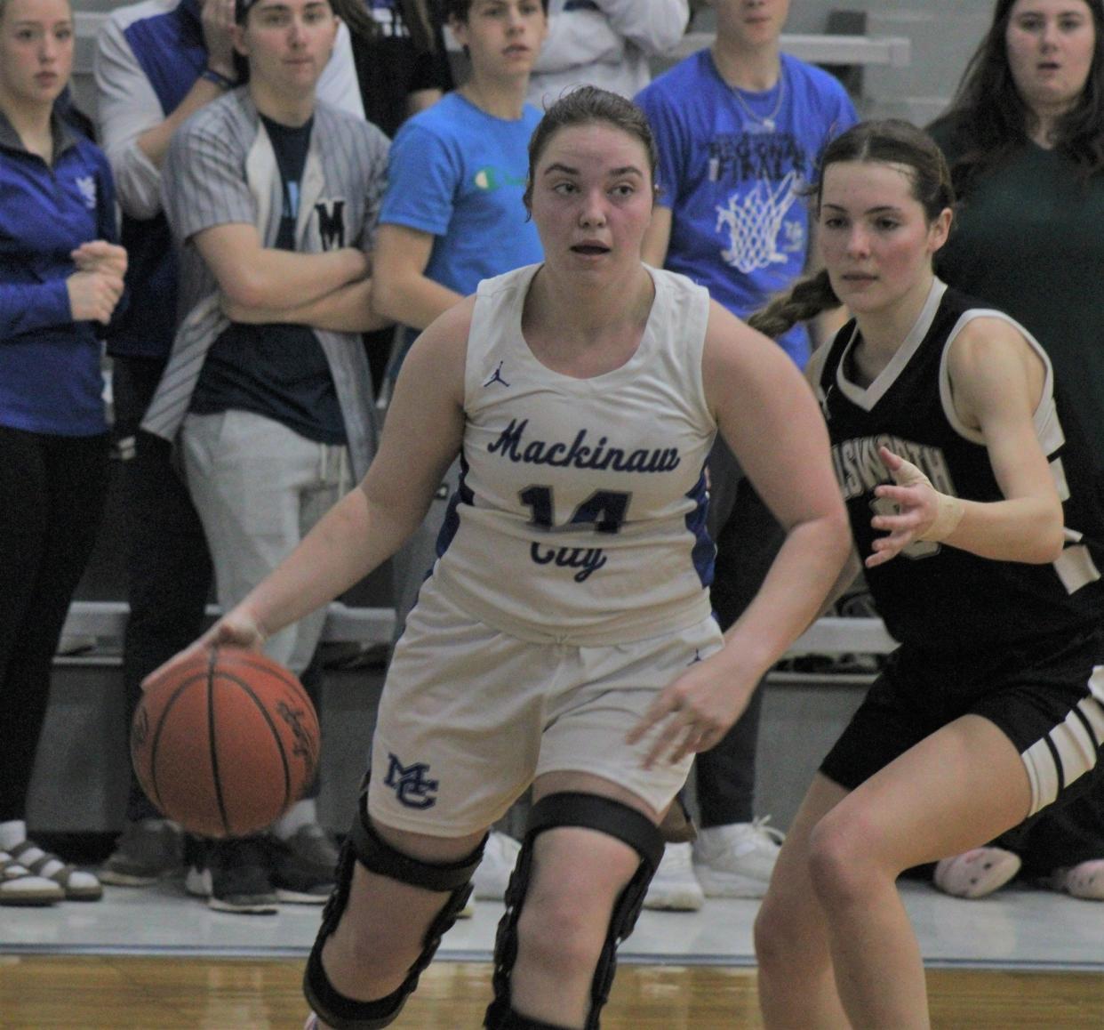 Jersey Beauchamp (14) and the Mackinaw City girls earned a crucial conference win over Burt Lake NMCA at home on Tuesday.