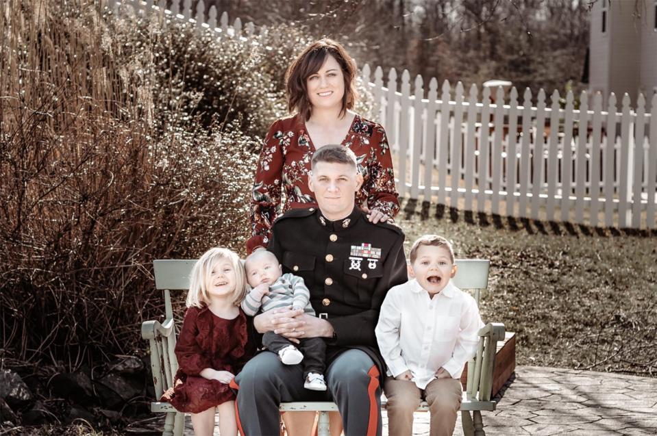 Tyler and Cassi Tidwell pose for a photo several years ago with their young children, left to right, Alex, Christian and Bobby. Tyler, a former Deer Creek and Navy football standout, died late last year after battling ALS.