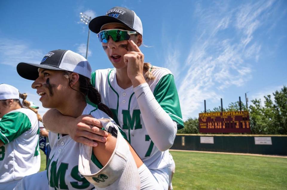 Dixon’s Brianna Humphries wipes her eye as she is carried by teammate Felesha LePenske after beating Marysville in the Division IV title softball game in 2022. LePenske is batting .478 this season for the No. 1-seed Rams, who have a first-round bye.