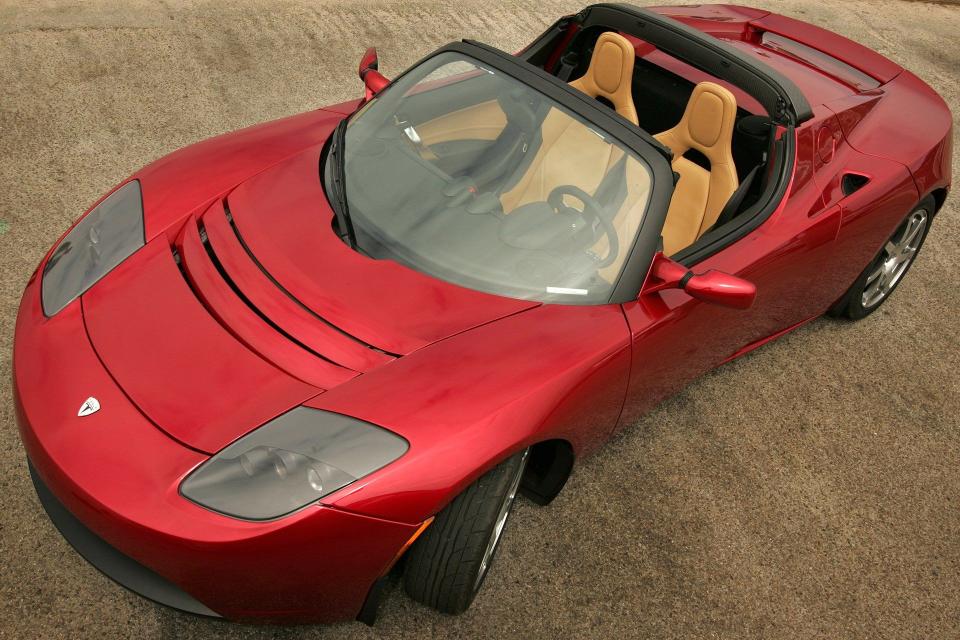 <img src="elon-musk-tesla-roadster.jpg" alt="A 2008 Tesla Roadster">