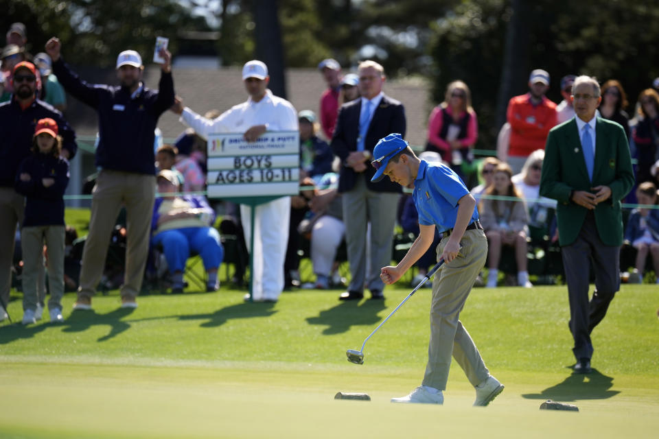 Brady Shaw, 11, of Pueblo, Colo., reacts after a putt at the Drive Chip & Putt National Finals at Augusta National Golf Club, Sunday, April 2, 2023, in Augusta, Ga. (AP Photo/Matt Slocum)