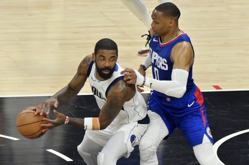 Dallas Mavericks guard Kyrie Irving (L) scored 23 points in a win over the Los Angeles Clippers on Tuesday in Los Angeles. File Photo by Jim Ruymen/UPI