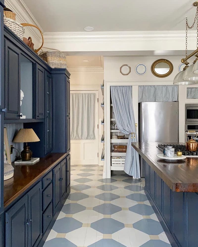 Newly renovated kitchen with blue painted cabinets.