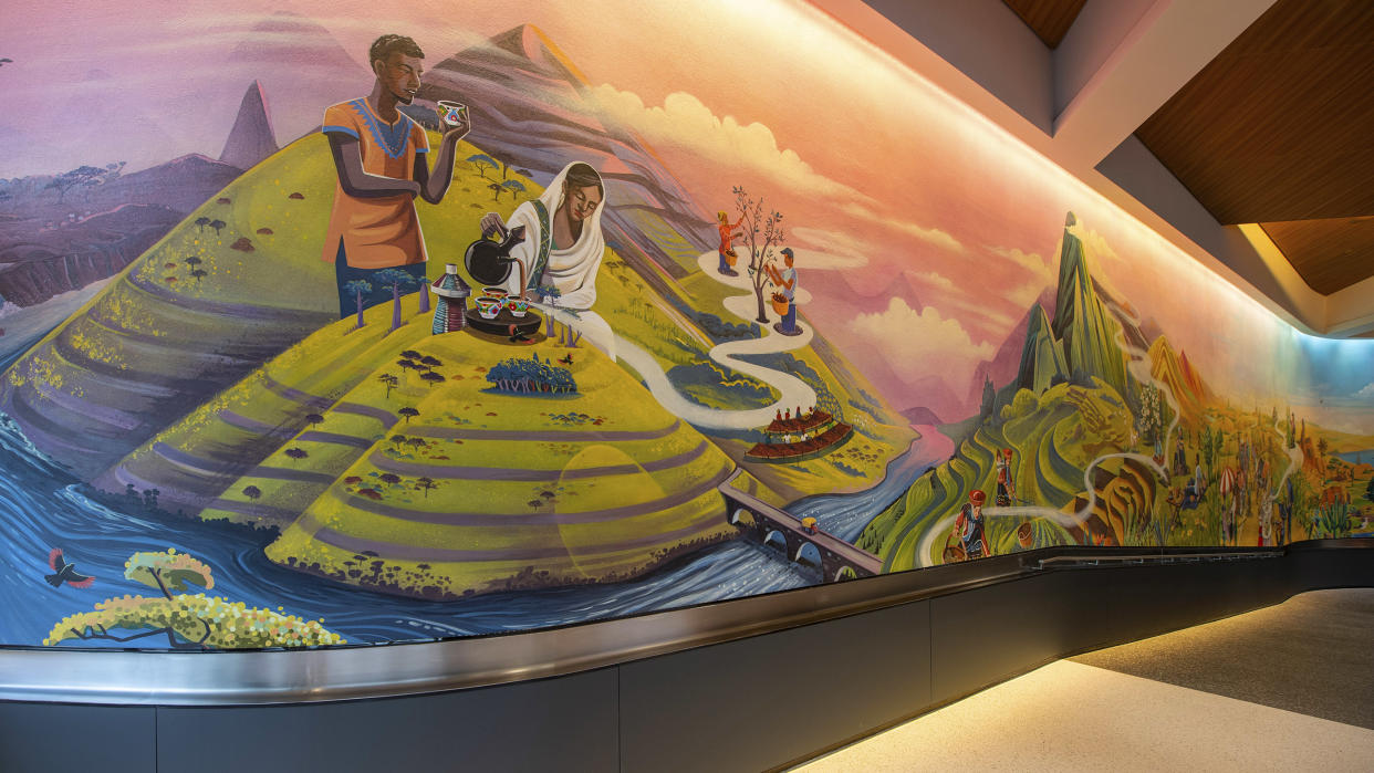 The mural inside Connections is designed to evoke feelings of recognition for the food and traditions observed in guests' homes and inspire the desire to try new flavors. (Photo: Walt Disney World Resort; David Roark, photographer)