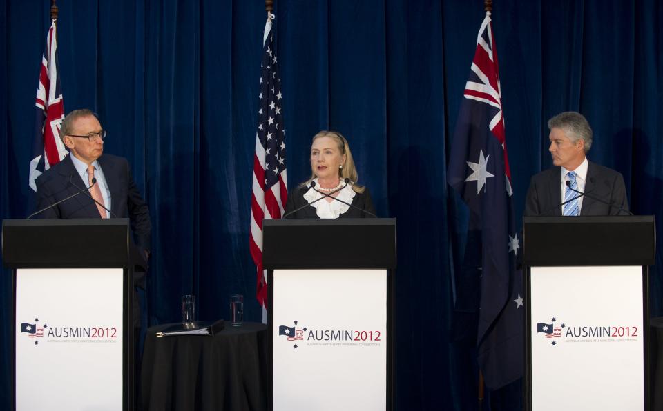 U.S. Secretary of State Hillary Rodham Clinton, center, speaks as Australian Foreign Minister Bob Carr, left, and Australian Minister of Defense Stephen Smith look on during a press conference following meetings as part of AUSMIN, or Australia-United States Ministerial Consultation, at the State Reception Centre in Kings Park in Perth, Australia, Wednesday, Nov. 14, 2012. (AP Photo/Saul Loeb, Pool)