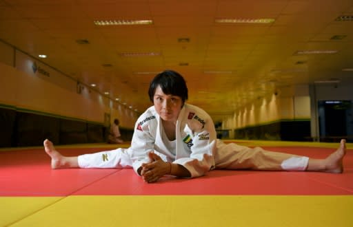 Japanese black belt Yuko Fujii, head coach of the Brazilian men's national team, warms up before a class in Rio de Janeiro on June 26, 2018: she made history as one of the very few women in the world to head any top-level male sports team, let alone judo