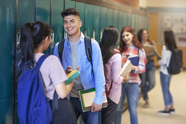 teens hanging by their locker