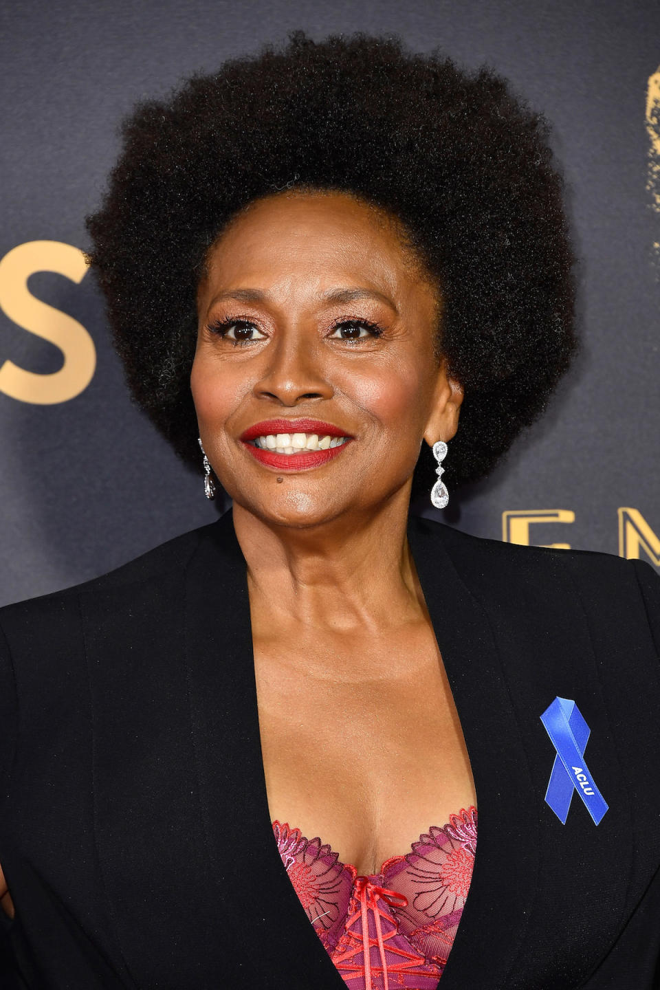 <p>Jenifer Lewis looked angelic with her tight coils and vibrant red lipstick. (Photo: Frazer Harrison/Getty Images) </p>