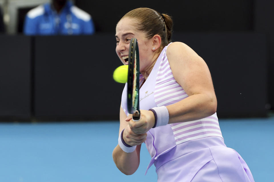 Jelena Ostapenko of Latvia plays a shot in her quarter-final match against Victoria Azarenka of Belarus during the Brisbane International tennis tournament in Brisbane, Australia, Friday, Jan. 5, 2024. (AP Photo/Tertius Pickard)