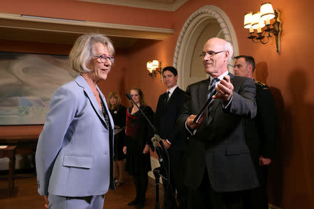 Joyce Murray is sworn-in as Canada's President of the Treasury Board and Minister of Digital Government by Privy Council Clerk Michael Wernick during a cabinet shuffle at Rideau Hall in Ottawa, Ontario, Canada, March 18, 2019. REUTERS/Chris Wattie