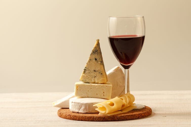 <span class="caption">The key to happiness?</span> <span class="attribution"><a class="link " href="https://www.shutterstock.com/image-photo/various-types-cheese-red-wine-154011416" rel="nofollow noopener" target="_blank" data-ylk="slk:Shutterstock;elm:context_link;itc:0;sec:content-canvas">Shutterstock</a></span>