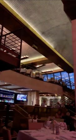 Ceiling lights in a restaurant sway during tremors felt in Palm Desert, California, U.S. during an earthquake that hit Southern California in this still frame taken from social media video dated July 5, 2019