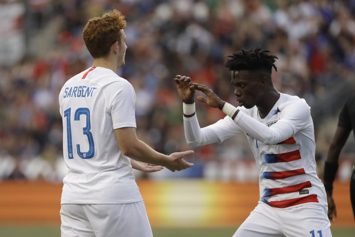 United States' Josh Sargent, left, and Tim Weah celebrate during an international friendly soccer match against Bolivia, Monday, May 28, 2018, in Chester, Pa. (AP Photo/Matt Slocum)