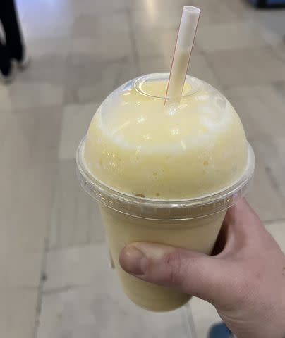 <p>Dana Ingemann</p> Also, eating out is fine. I picked up this mango-pineapple smoothie at a shop in my train station.