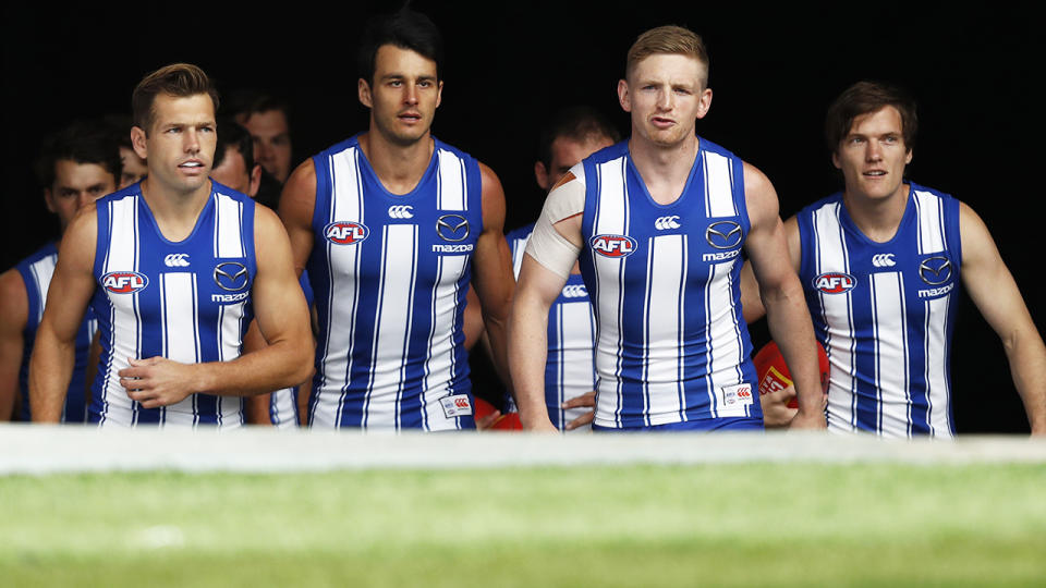 North Melbourne players, pictured here running out before their round 1 clash with St Kilda on Sunday.