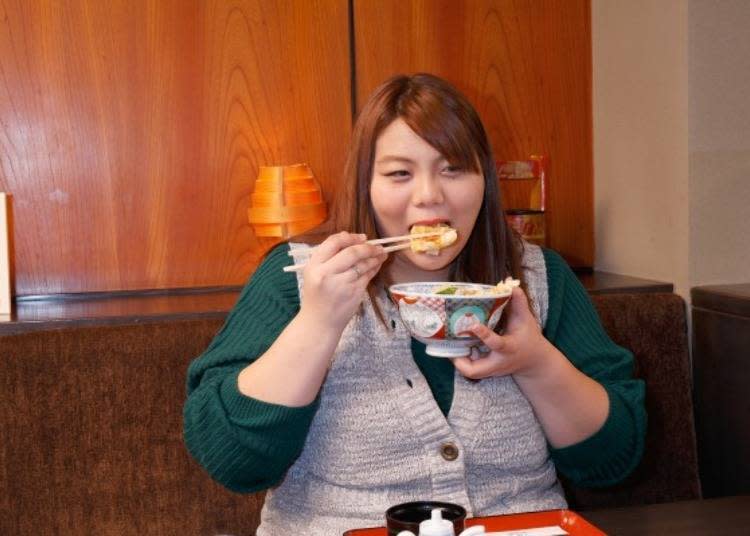 Digging into a deep fried pork bowl!