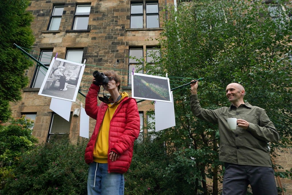 Photographers Brian Hartley and Dylan Lombard (L) at their exhibition (Andrew Milligan/PA) (PA Wire)