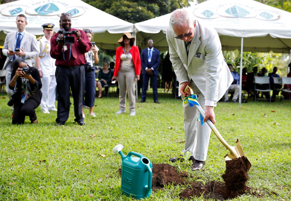 KINGSTOWN, SAINT VINCENT AND THE GRENADINES - MARCH 20: Prince Charles, Prince of Wales plants a tree during his visit to the Botanical Gardens during a visit to St. Vincent and the Grenadines on March 20, 2019 in Kingstown, St. Vincent and the Grenadines. (Photo by Phil Noble â WPA Pool/Getty Images)