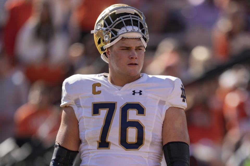 Notre Dame offensive lineman Joe Alt warms up before a game against Clemson in November.