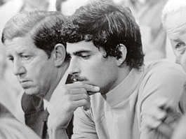 Mark Spitz, right, sits with U.S. assistant coach Peter Daland at a press conference Sept. 5, 1972, after the Arab terrorist attack on Israeli athletes at the Summer Olympic Games at Munich, West Germany. Associated Press
