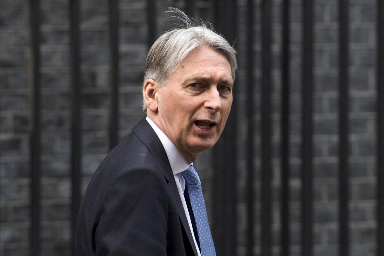 New figures: Chancellor Philip Hammond will make his Spring Statement on the UK's economy next month: EPA