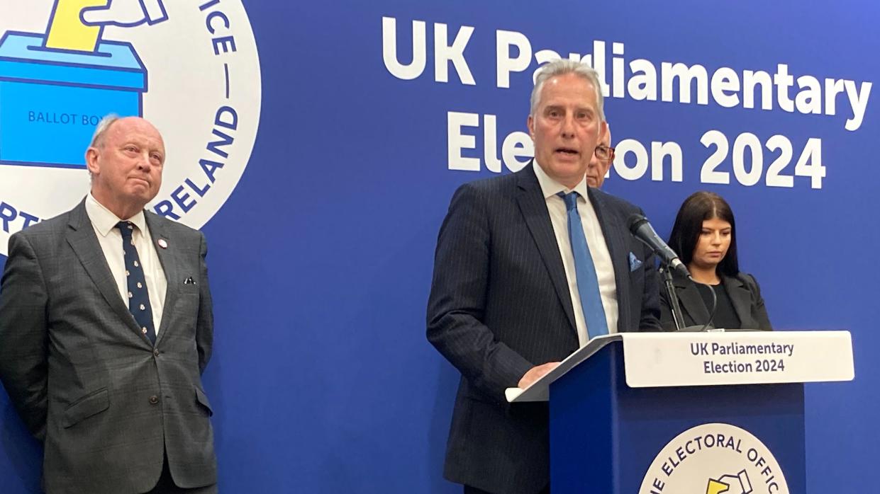 Jim Allister and Ian Paisley standing on declaration podium