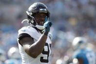 FILE - Then-Jacksonville Jaguars defensive end Yannick Ngakoue (91) reacts following a play against the Carolina Panthers during the first half of an NFL football game in Charlotte, N.C., Sunday, Oct. 6, 2019. NFL teams can always use more pass rushers, as evidenced by the NFC North where all four teams have spent big to acquire them over the last three years. Minnesota, trying to overtake defending division champ Green Bay, was the latest example with the acquisition of defensive end Yannick Ngakoue.(AP Photo/Brian Blanco, File)