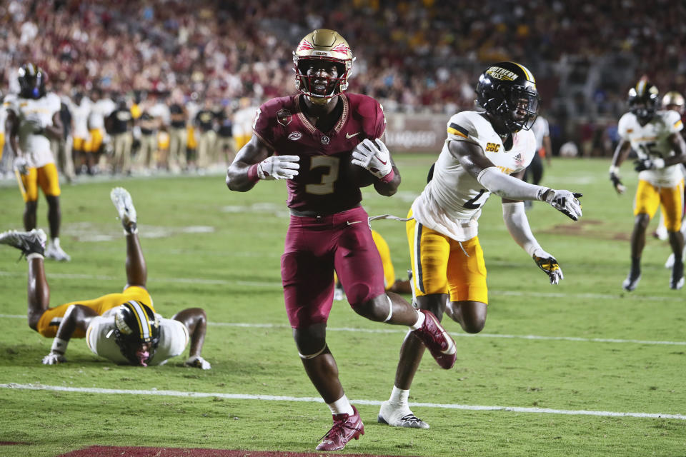 Florida State running back Trey Benson (3) runs for a touchdown in the first quarter of an NCAA college football game against Southern Mississippi, Saturday, Sept. 9, 2023, in Tallahassee, Fla. (AP Photo/Phil Sears)