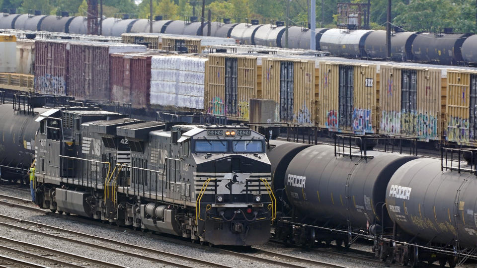 FILE - Norfolk Southern locomotives work in the in the Conway Terminal on Sept. 15, 2022, in Conway, Pa. The railroad union that rejected its deal with the nation's freight railroads earlier this month even though it offered 24% raises now has a new tentative agreement, but officials cautioned that the contract dispute won't be fully settled until all 12 rail unions approve their agreements this fall. (AP Photo/Gene J. Puskar, File)