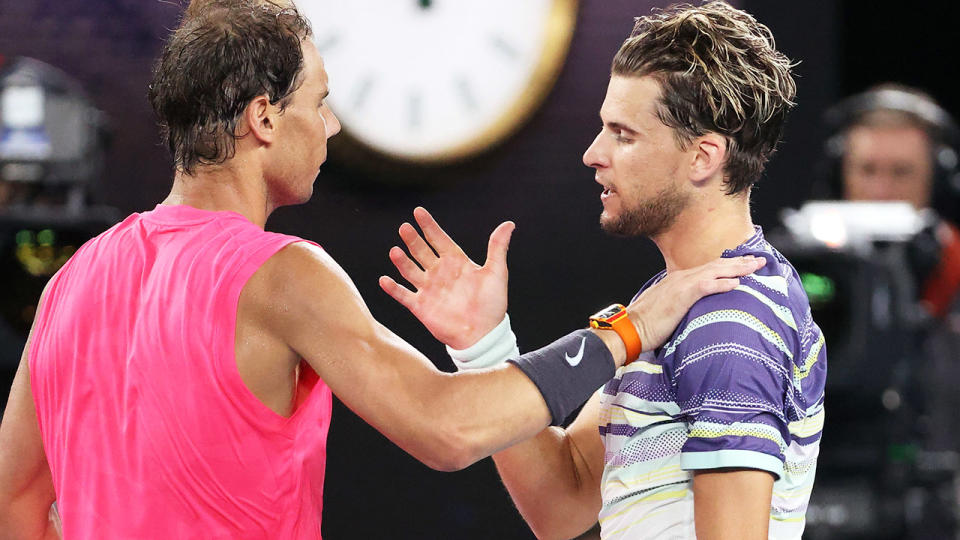 Rafael Nadal, pictured here embracing Dominic Thiem after their match at the Australian Open.